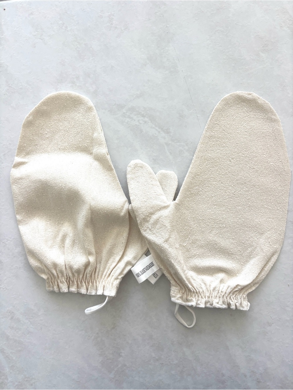 Set of two 100% raw silk exfoliating / dry brushing gloves for body and face.